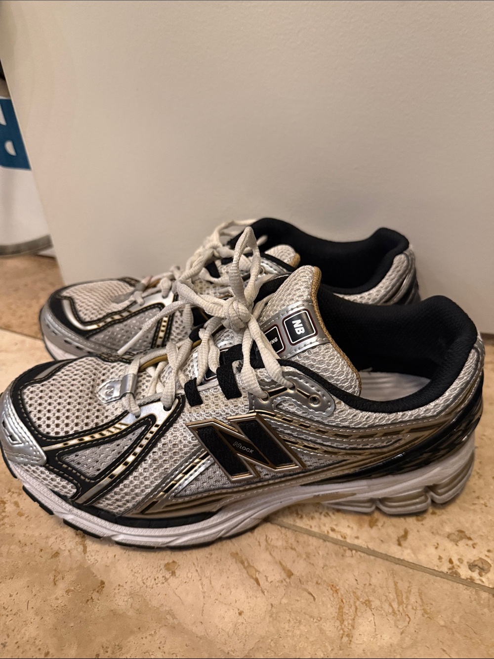 New Balance Silver, Black & Gold Athletic Sneakers
